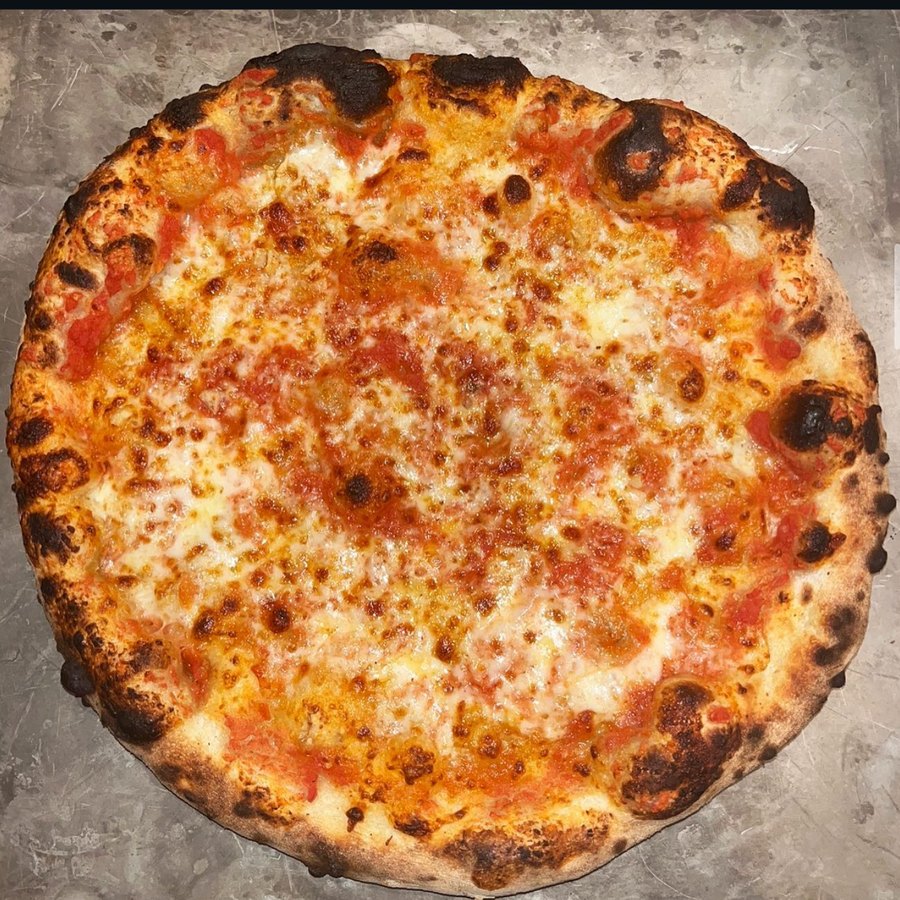 NY-style sourdough pizza with San Marzano tomato and mozzarella
