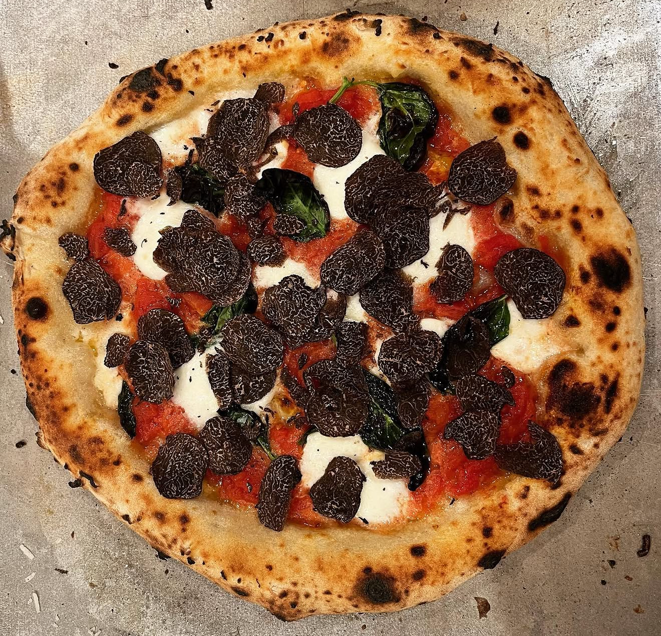 Neapolitan margherita with black truffle